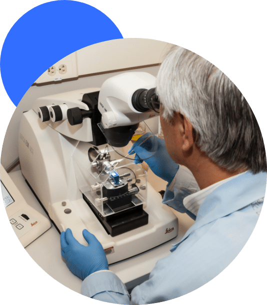 anti-aging professional doing research on a microscope